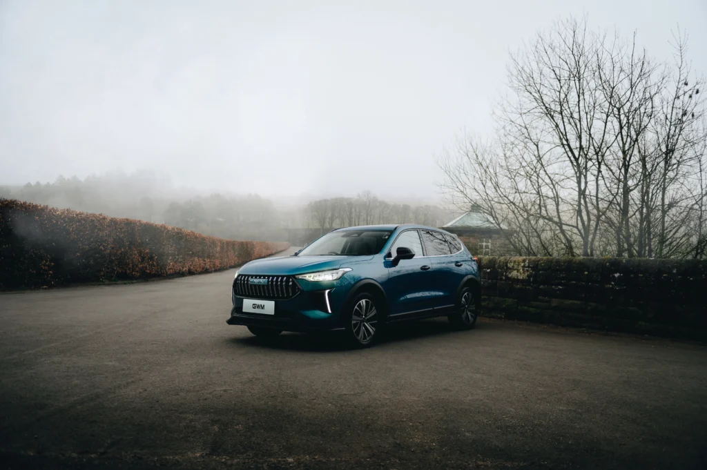 GWM Haval arctic blue at angle against wall