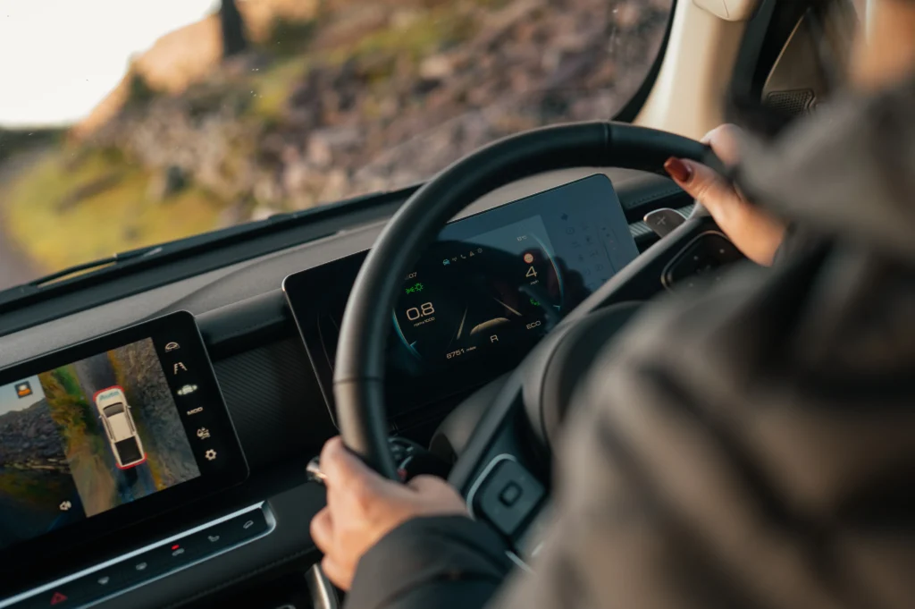 Woman behind the wheel of POER 300.